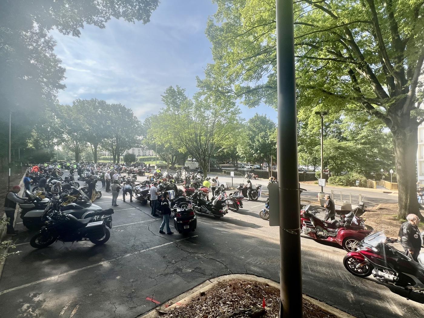 Riders and motorcycles filling a sunny lot at the 2025 Ride 2 Remember in Charlotte, North Carolina