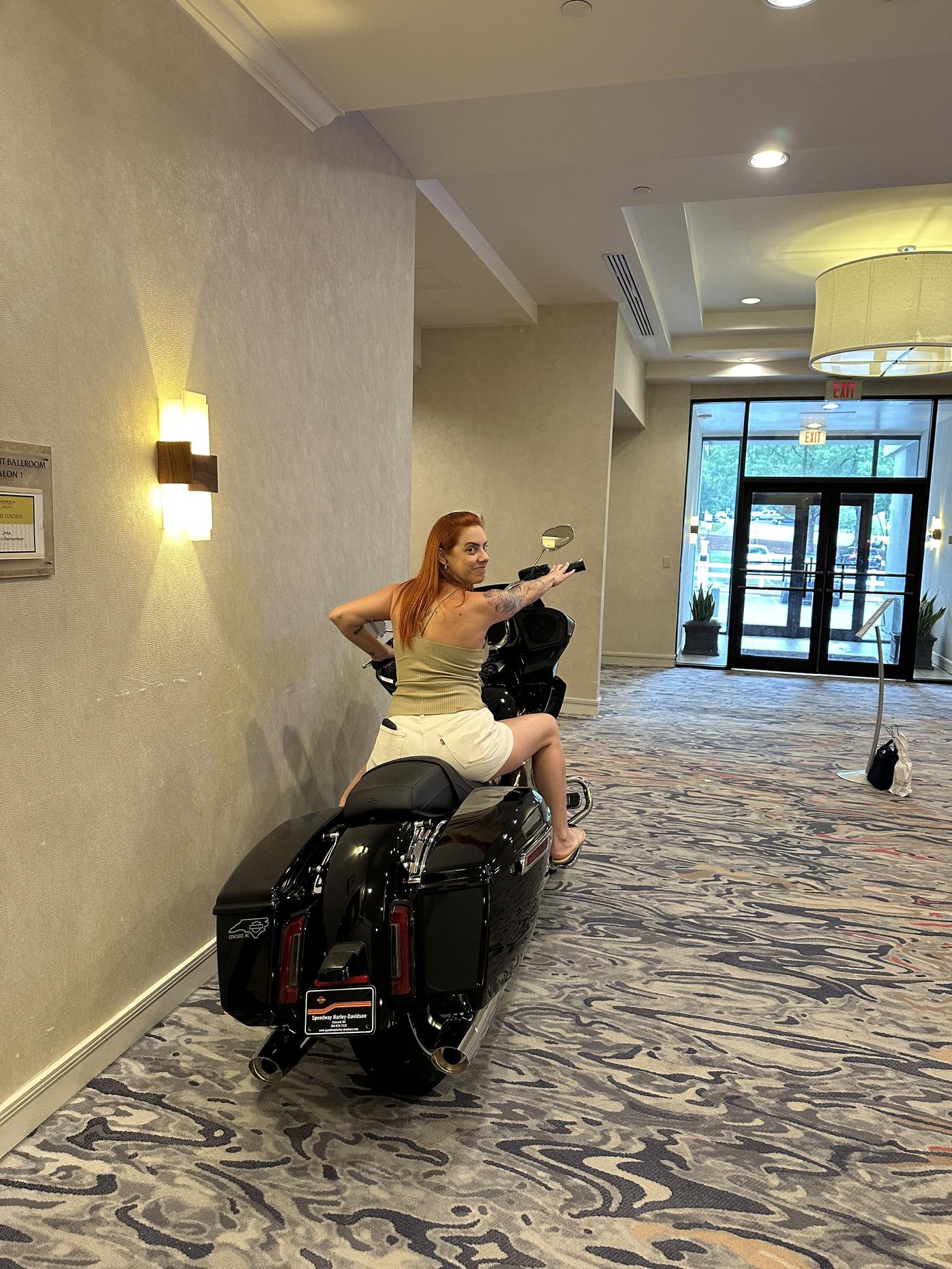 Fabi looking back on a Harley at the 2025 Ride 2 Remember in Charlotte, North Carolina