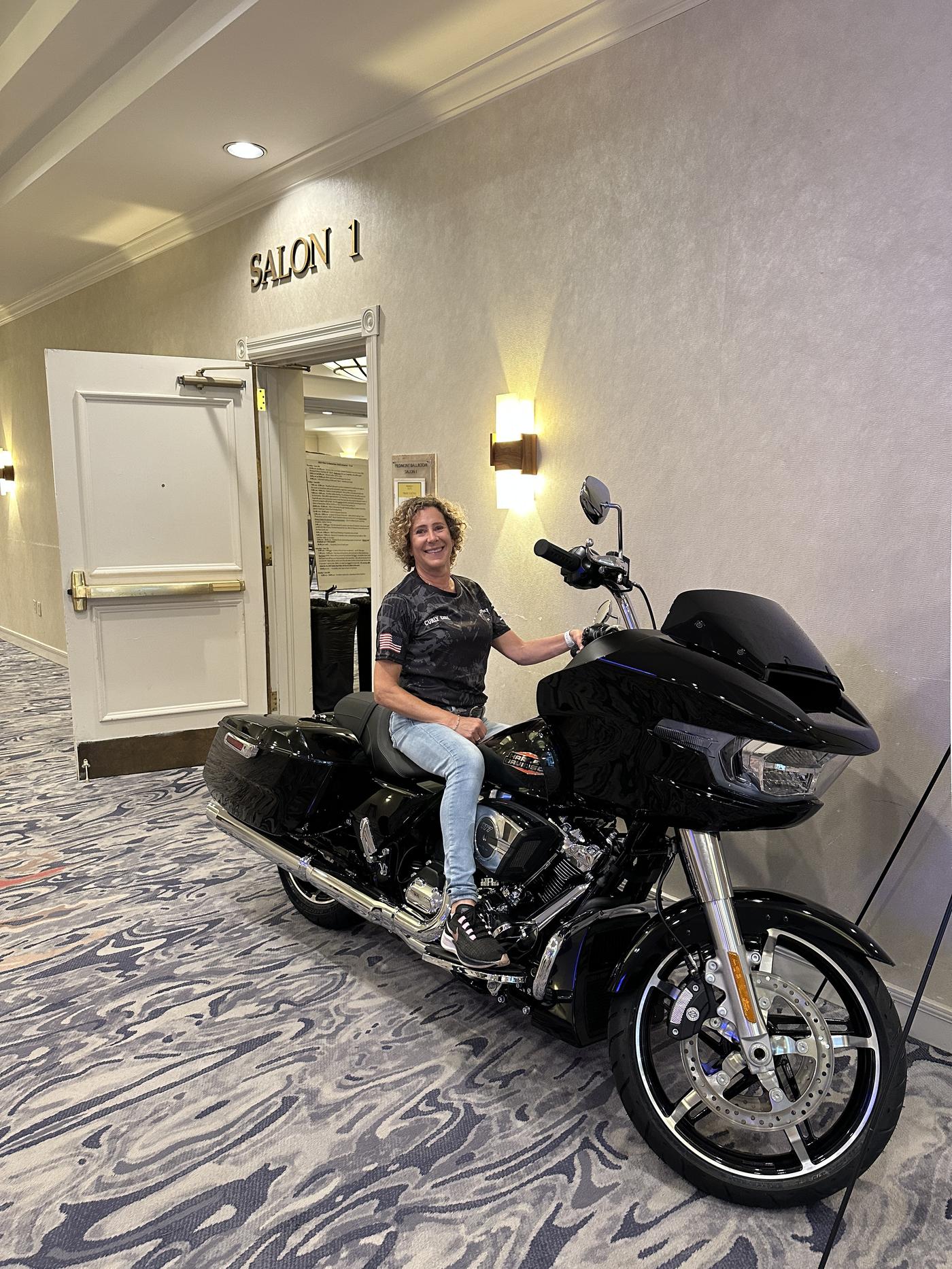 A rider on a bike indoors at the 2025 Ride 2 Remember in Charlotte, North Carolina